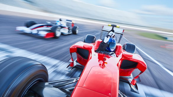 Formula 1 race cars competing on a track representing Selkire high-performance RevOps execution.