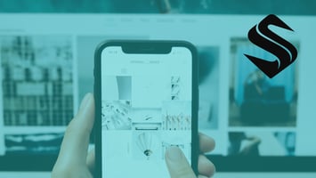 Smartphone displaying a social media feed, representing how Selkire views social media as a distribution channel within a broader marketing strategy.