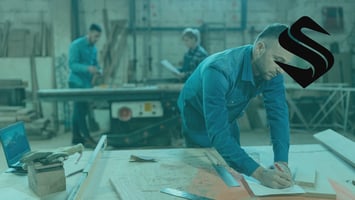 Small Business owner working while their CRM handles the rest