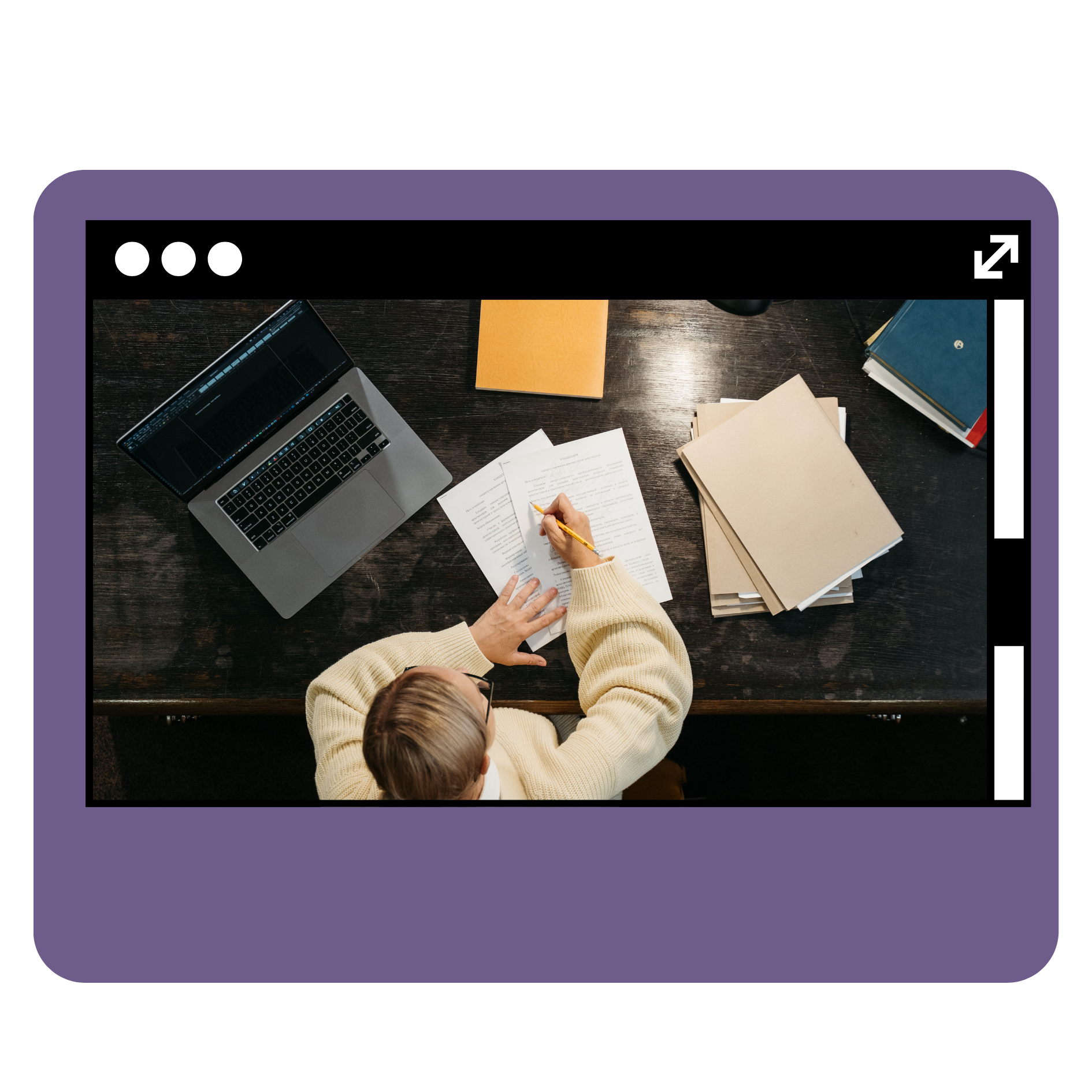 Top-down view of a woman writing at a desk with a laptop and documents, representing how Selkire supports small business owners with systems, structure, and CRM implementation Top-down view of a woman writing at a desk with a laptop and documents, representing how Selkire supports small business owners with systems, structure, and CRM implementation