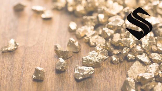 Close-up of pyrite and gold nuggets symbolizing the AI gold rush, where hype-driven automation agencies, fragile RevOps systems, CRM shortcuts, and flashy AI consulting are mistaken for operational expertise