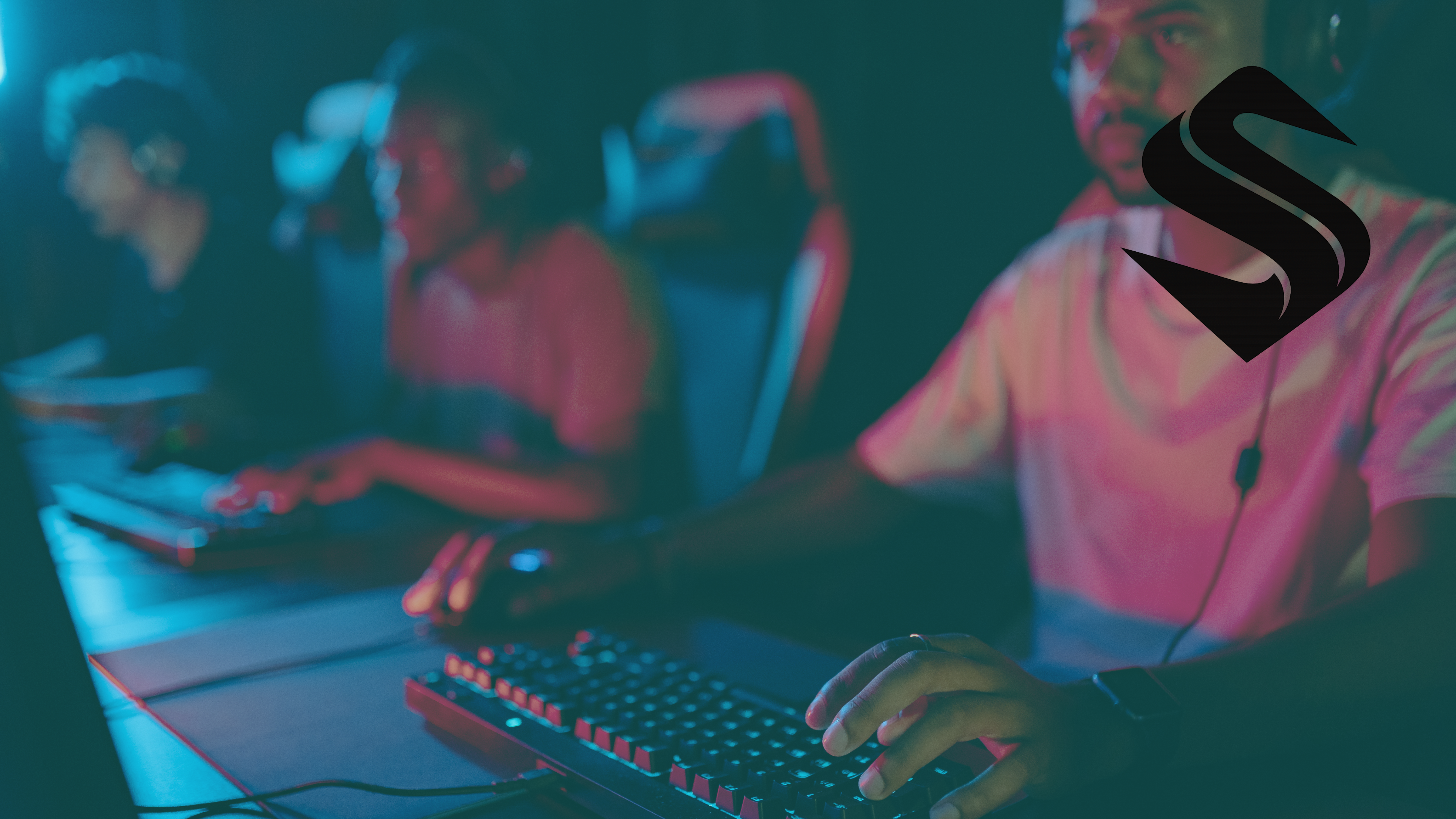 Digital illustration of a people working at a computer with vibrant blue and orange neon lighting